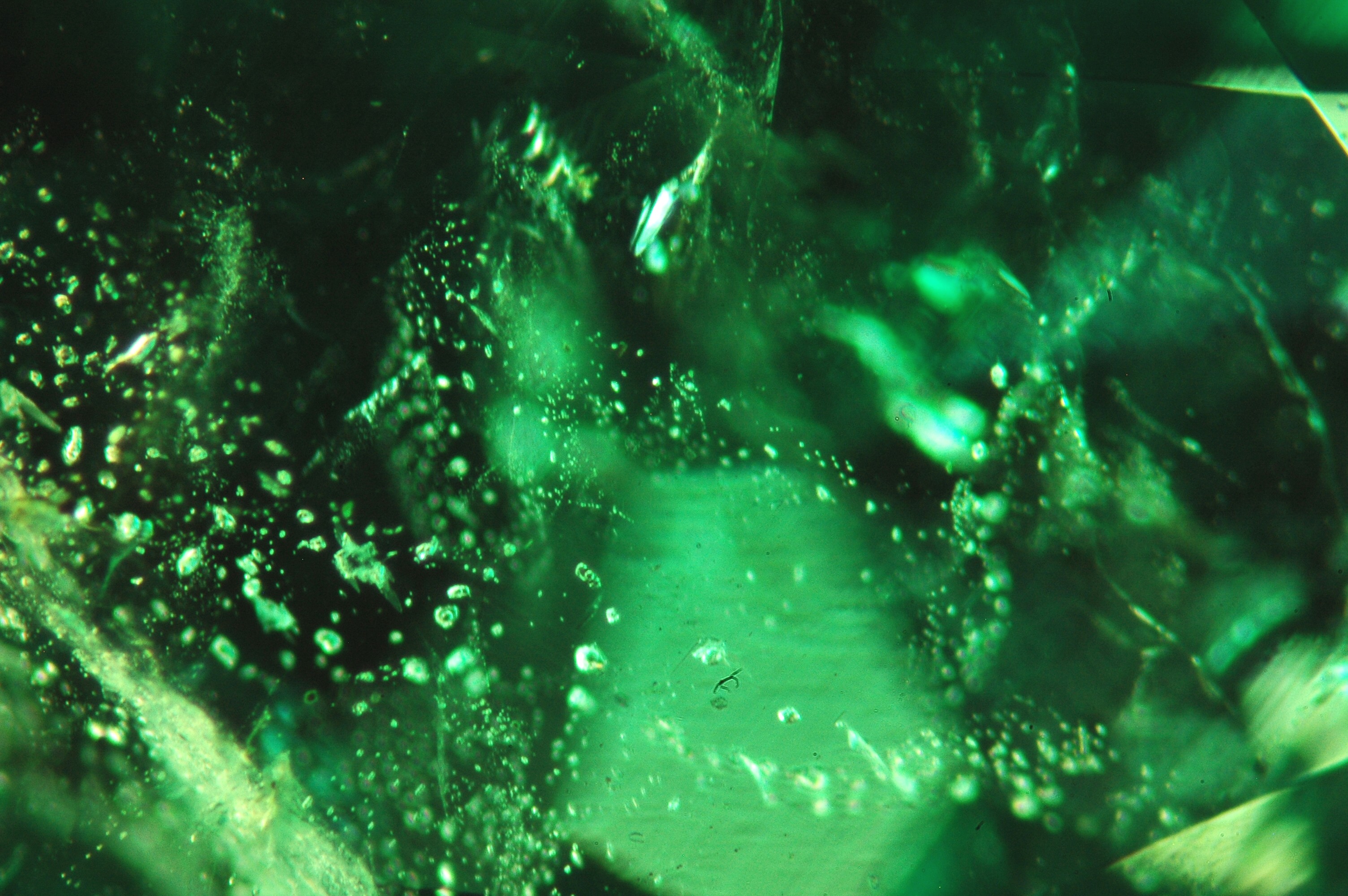 Zambian emerald with 2phase inclusions and fingerprint inclusion 